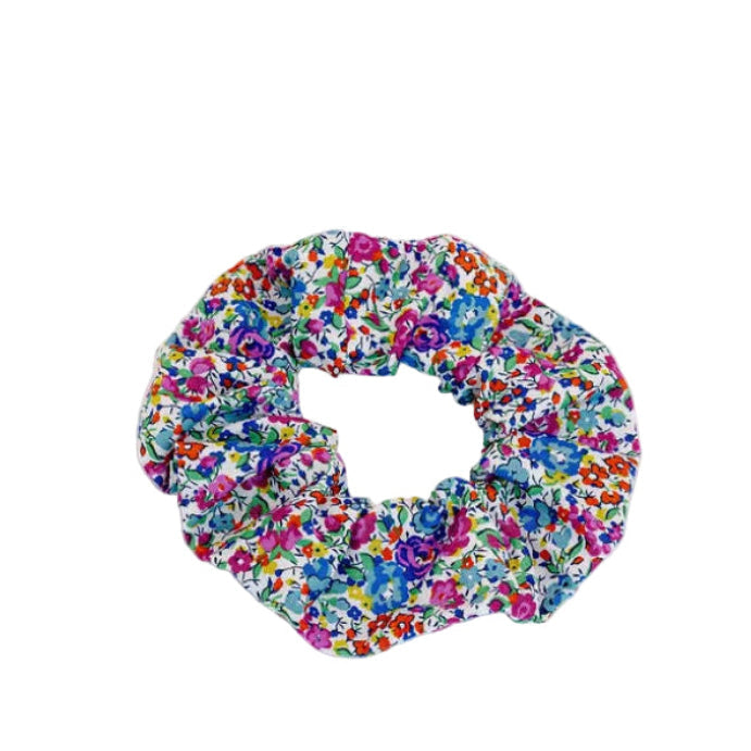 Liberty of London | Emma &amp; Georgina Fabric Print Scrunchie.&nbsp; Add a touch of timeless elegance to your hairstyle with this iconic Liberty of London Tana Lawn cotton print scrunchie. Emma &amp; Georgina print is a classic, ditsy floral design blending two dense, archival Victorian floral patterns. Emma was originally designed in the 1970s and Georgina was added in 2000.