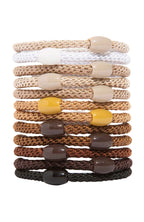 Set of braided hair ties in various colors on a white background
